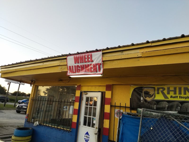 Wheel Alignment banner above the Corner Tires Center entrance